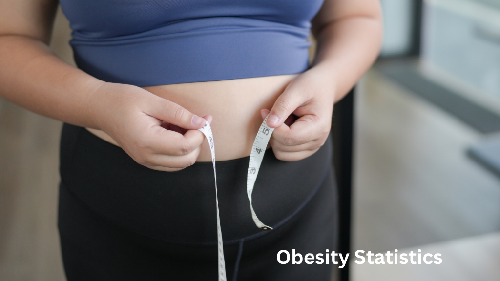 Close-up of a person measuring their waist with a tape measure, illustrating obesity and body weight concerns.