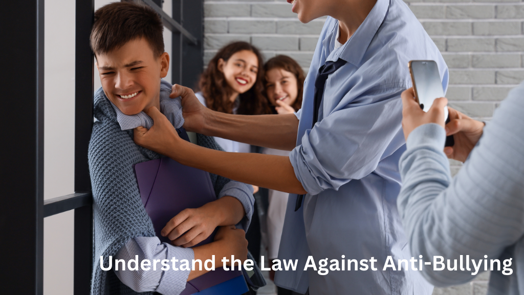 Student being physically bullied by another student while others watch and record with a phone, illustrating school bullying and anti-bullying laws.