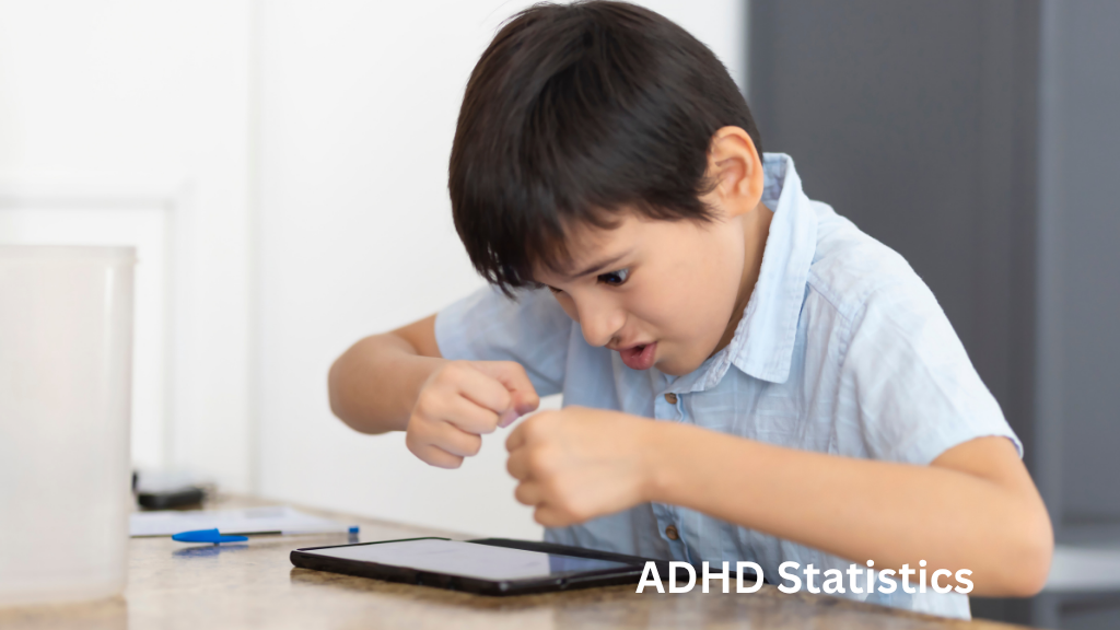 Young boy showing signs of hyperactivity and frustration while using a tablet, representing ADHD symptoms in children